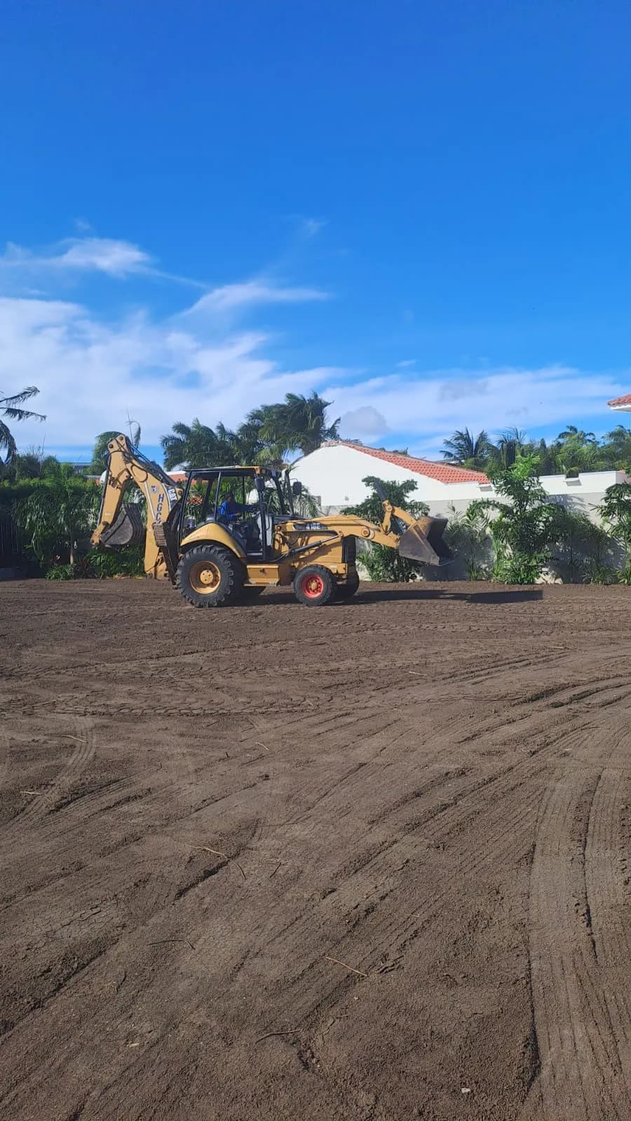 Grading and soil preparation before anything is installed.